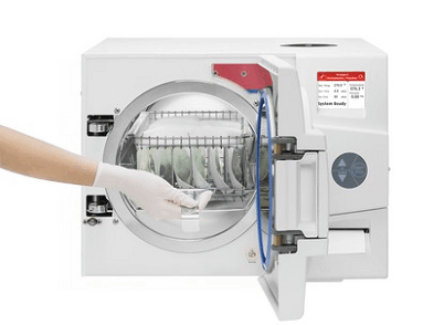 Autoclave being filled with pouches containing footcare tools